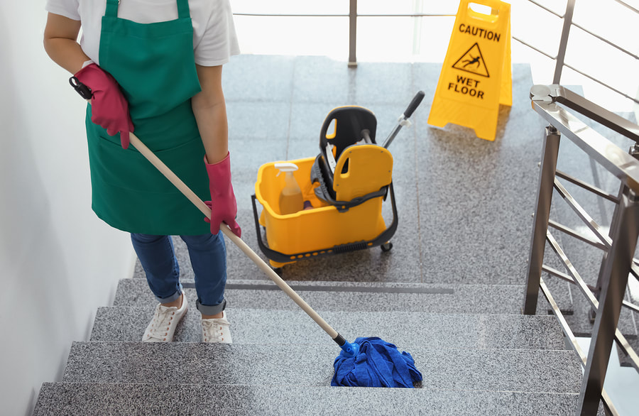 woman mopping the floor